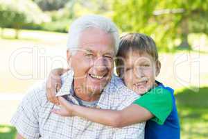 Happy grandfather with his grandson