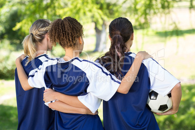 Pretty football players celebrating their win