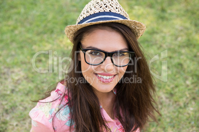 Pretty brunette smiling in park