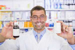 Pharmacist showing medicines jar