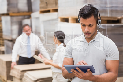 Female manager using digital tablet