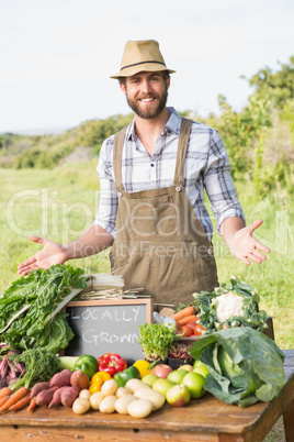 Farmer by his stall at the market