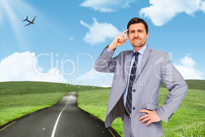 Composite image of thinking businessman