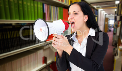 Composite image of pretty businesswoman shouting with megaphone