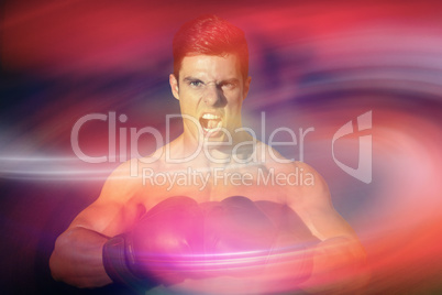 Composite image of muscular boxer