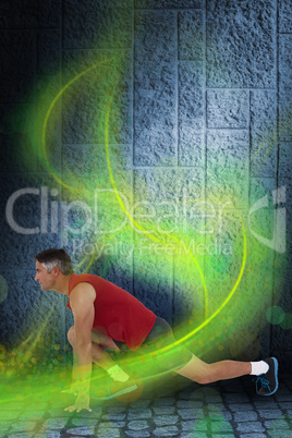 Composite image of fit man stretching his legs