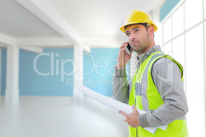 Composite image of architect on the phone