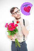 Composite image of geeky hipster offering bunch of roses