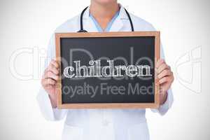 Children against doctor showing little blackboard