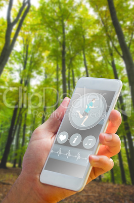 Composite image of hand holding smartphone