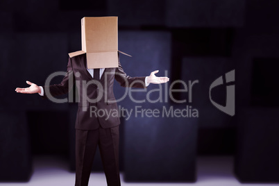 Composite image of anonymous businessman with hands out