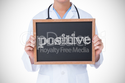 Positive against doctor showing little blackboard