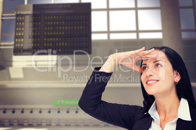 Composite image of pretty businesswoman looking with hand up