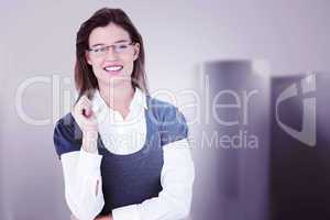 Composite image of smiling woman looking at camera