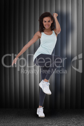 Composite image of fit woman doing aerobic exercise