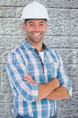 Composite image of confident manual working wearing hardhat