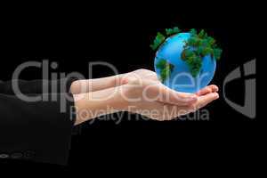 Composite image of businesswomans hands presenting