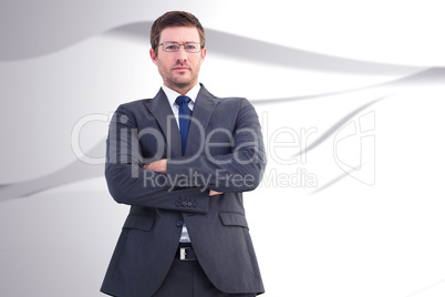 Composite image of frowning businessman looking at camera