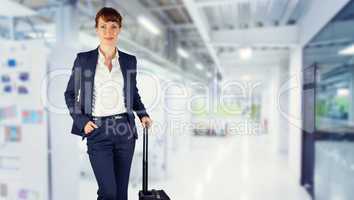 Composite image of businesswoman with suitcase