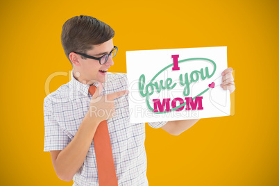 Composite image of geeky hipster smiling and showing card