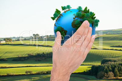 Composite image of businessman holding hand out in presentation