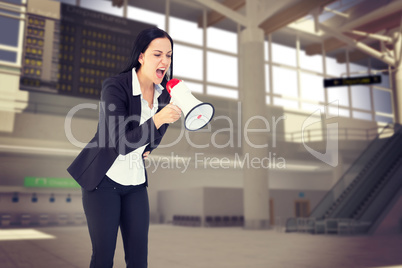 Composite image of pretty businesswoman shouting with megaphone