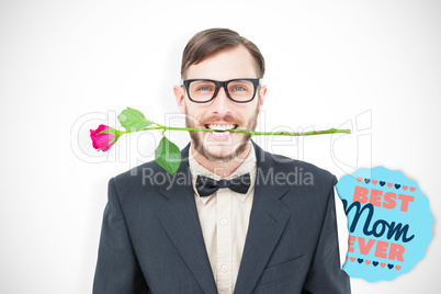 Composite image of geeky hipster holding rose between teeth