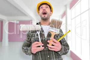 Composite image of screaming manual worker holding various tools