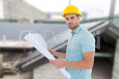 Composite image of confident male architect holding blueprint