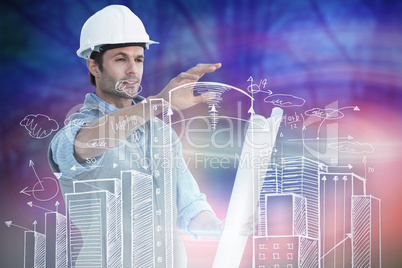 Composite image of architect with blueprint