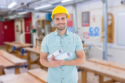 Composite image of happy male architect holding blueprints