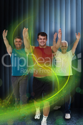 Composite image of fit men stretching their arms
