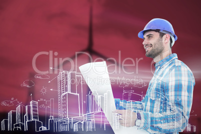 Composite image of smiling engineer looking away while holding b