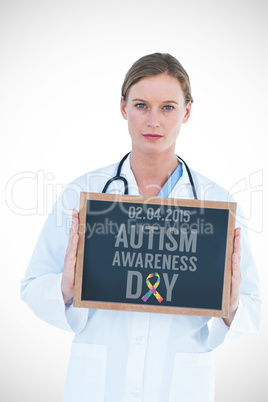 Composite image of doctor showing chalkboard