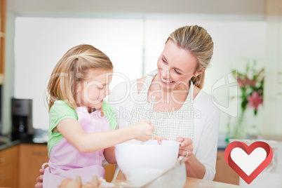 Composite image of mother and daughter having fun in the kitchen