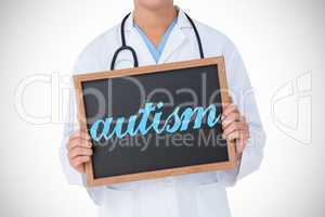 Autism against doctor showing little blackboard