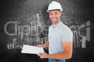 Composite image of portrait of manual worker holding clipboard