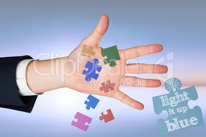 Composite image of hand with fingers spread out