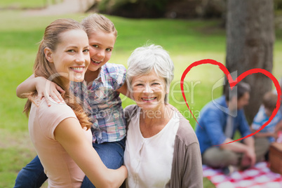 Composite image of grandmother mother and daughter with family i