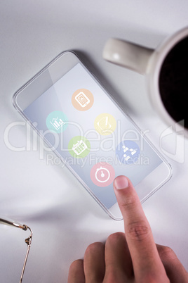 Composite image of businessman using smartphone