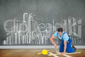 Composite image of repairman fixing screw on plank