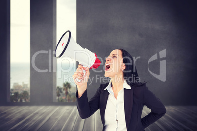 Composite image of pretty businesswoman shouting with megaphone