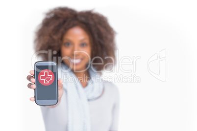 Composite image of woman with afro showing her smartphone