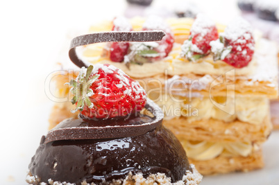 selection of fresh cream cake dessert plate