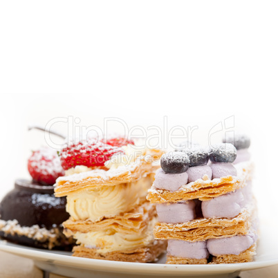 selection of fresh cream cake dessert plate