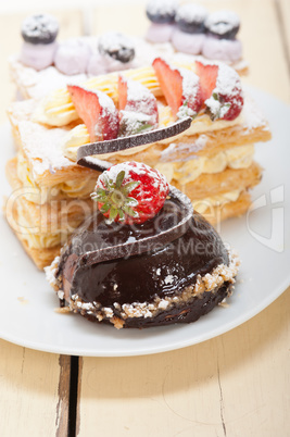 selection of fresh cream cake dessert plate