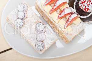 selection of fresh cream cake dessert plate