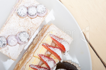 selection of fresh cream cake dessert plate