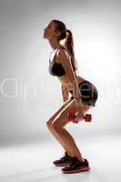 Sporty woman doing aerobic exercise