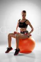 Sporty woman doing aerobic exercise